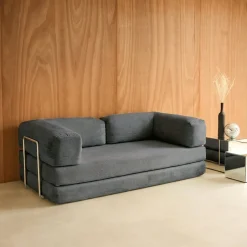 Divano letto futon in velluto a coste e struttura cromata