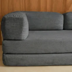 Divano letto futon in velluto a coste e struttura cromata