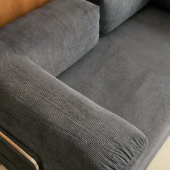 Divano letto futon in velluto a coste e struttura cromata
