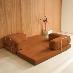 Divano letto futon in velluto a coste e struttura cromata