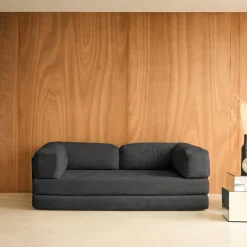 Divano letto futon in velluto a coste e struttura cromata
