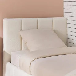 Letto contenitore con rete a doghe e testiera 90x190cm imbottito bouclé