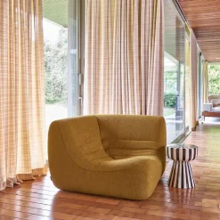 Poltrona angolare in bouclé testurizzato
