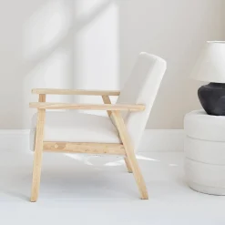 Poltrona scandinava in legno e tessuto bouclé
