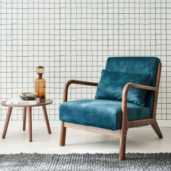 Poltrona scandinava in velluto e legno di hevea tinto noce scuro