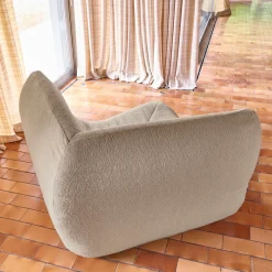 Poltrona angolare in bouclé testurizzato