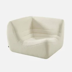 Poltrona angolare in bouclé testurizzato