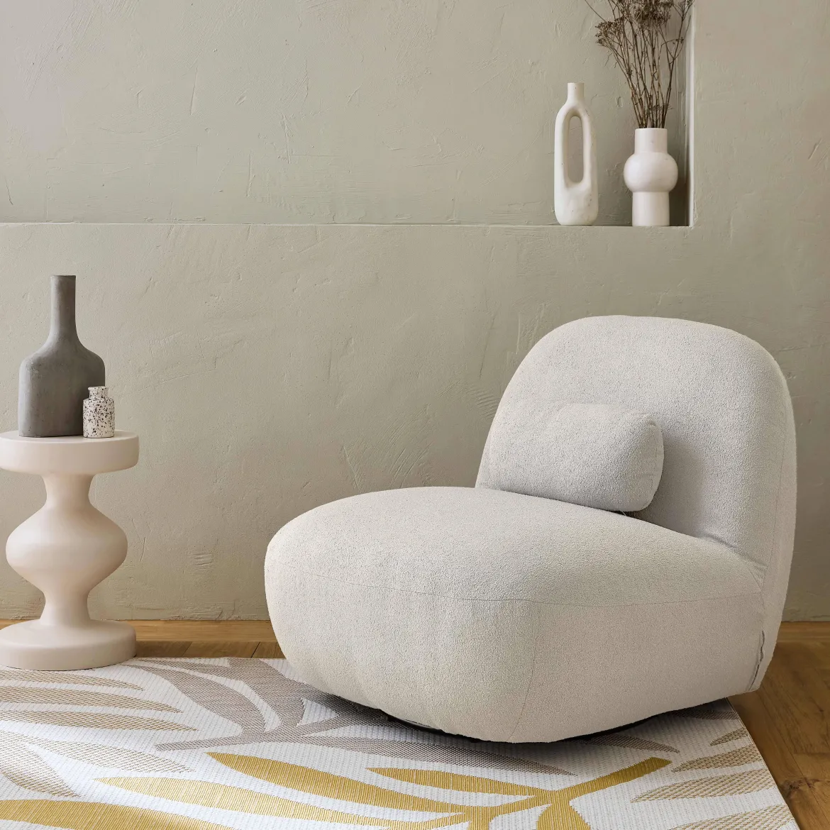Poltrona girevole 360° bouclé