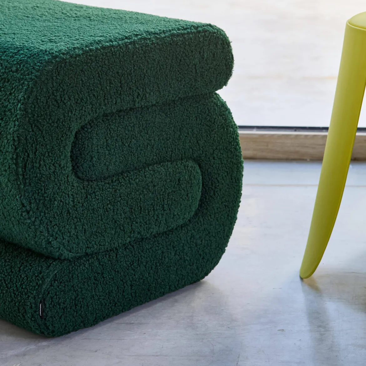 Pouf in bouclé