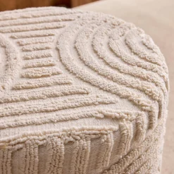 Pouf rotondo in bouclé testurizzato