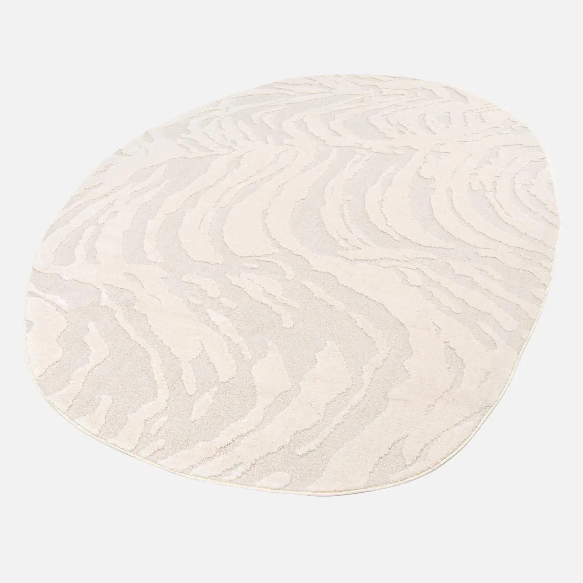 Tappeto interno a forma di ciottolo con rilievo crema