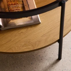 Tavolino rotondo a doppio ripiano in vetro, legno e metallo