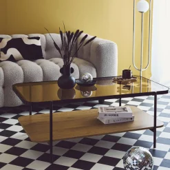 Tavolino vintage in metallo nero con piano in vetro